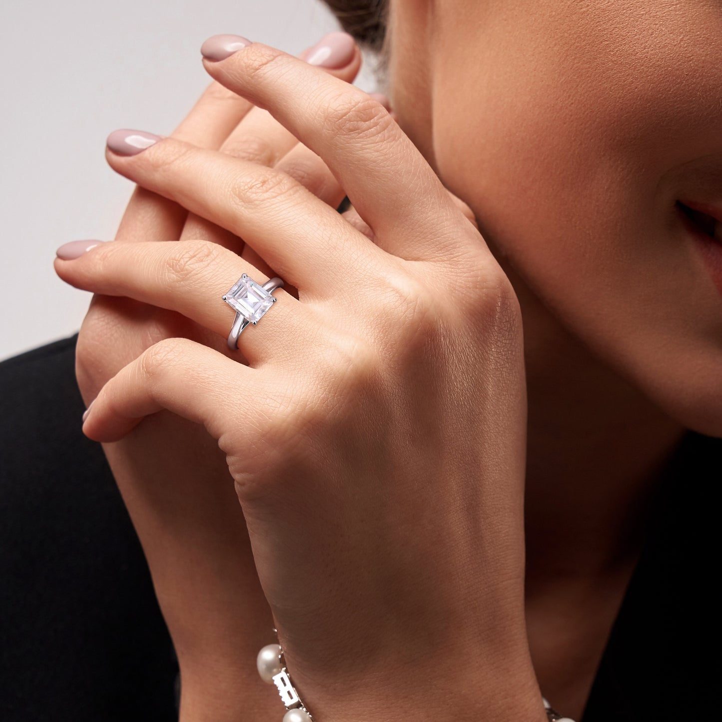 3 1/2ct Dew emerald cut created moissanite solitaire ring in 10k white gold