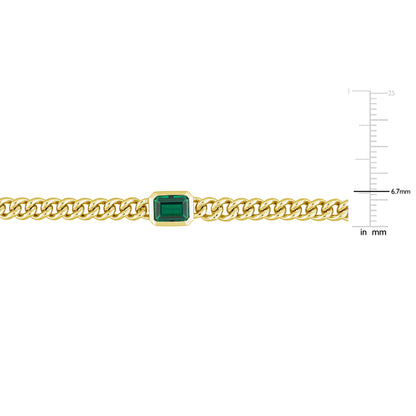 Curb link necklace with emerald center stone