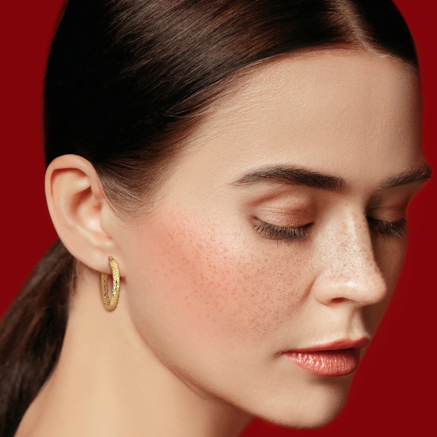 31 MM Diamond cut hoop earrings in yellow plated sterling silver