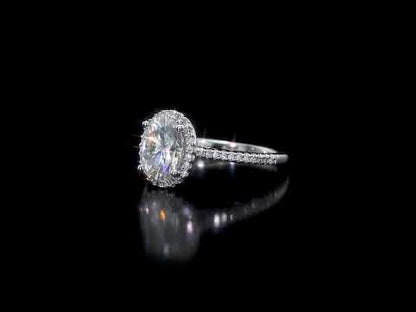 2ct Dew oval created moissanite and 1/4ct tw diamond double halo engagement ring in 14k white gold