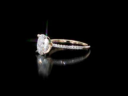 2ct Dew created white moissanite and 1/10ct tw diamond oval solitaire engagement ring in 14k gold