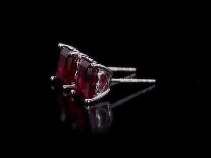 2 1/2 ct TGW Garnet fashion post earrings silver