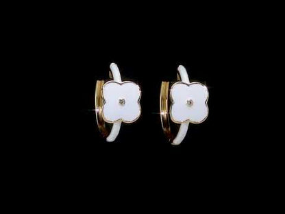 White enamel Huggies with sapphire stone