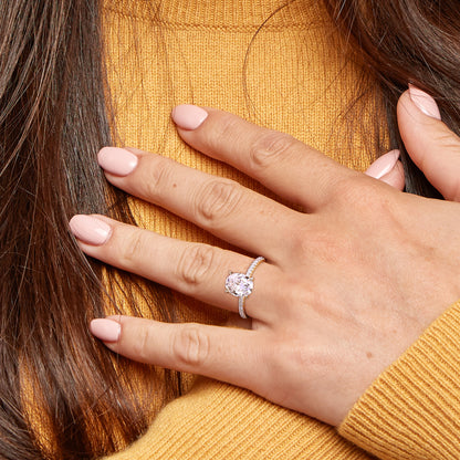 2ct Dew created white moissanite and 1/10ct tw diamond oval solitaire engagement ring in 14k gold